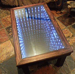 Infinity mirror built into coffee table